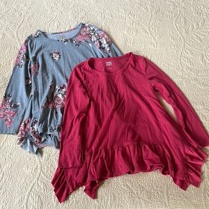 Two ruffle hem shirts